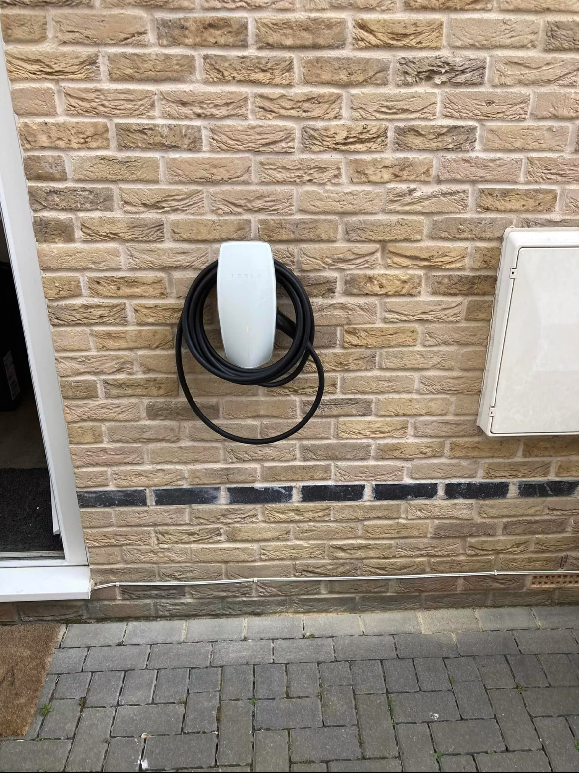 EV charger installed on a house wall